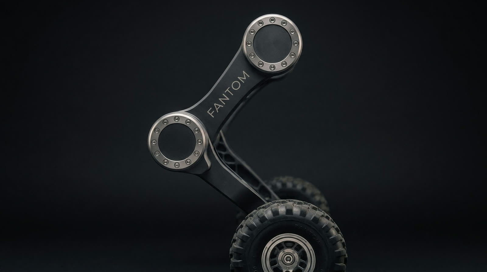 Detail of one leg module: hip disc actuator, link, knee disc actuator and wheel